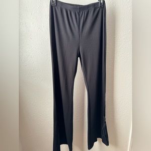 Cotton flare pants with bows on the bottom sides